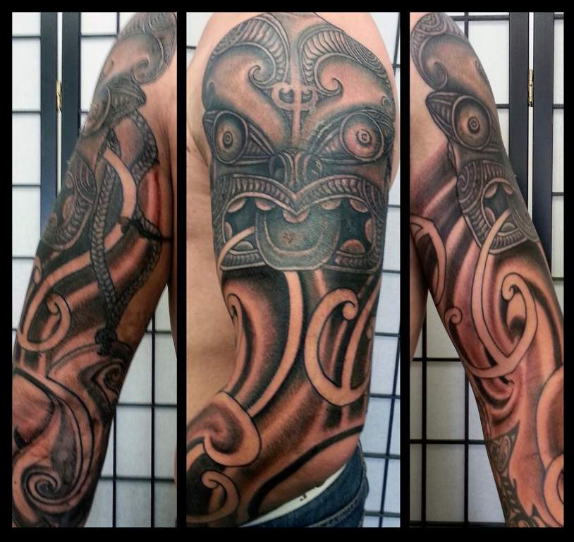 MaoriJapanese-Tiki-Arm - Zealand Tattoo