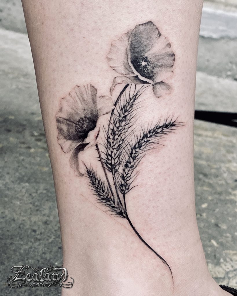 Black flowers tattooed on the arm  Tattoogridnet